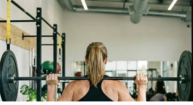 Clients training together in the gym