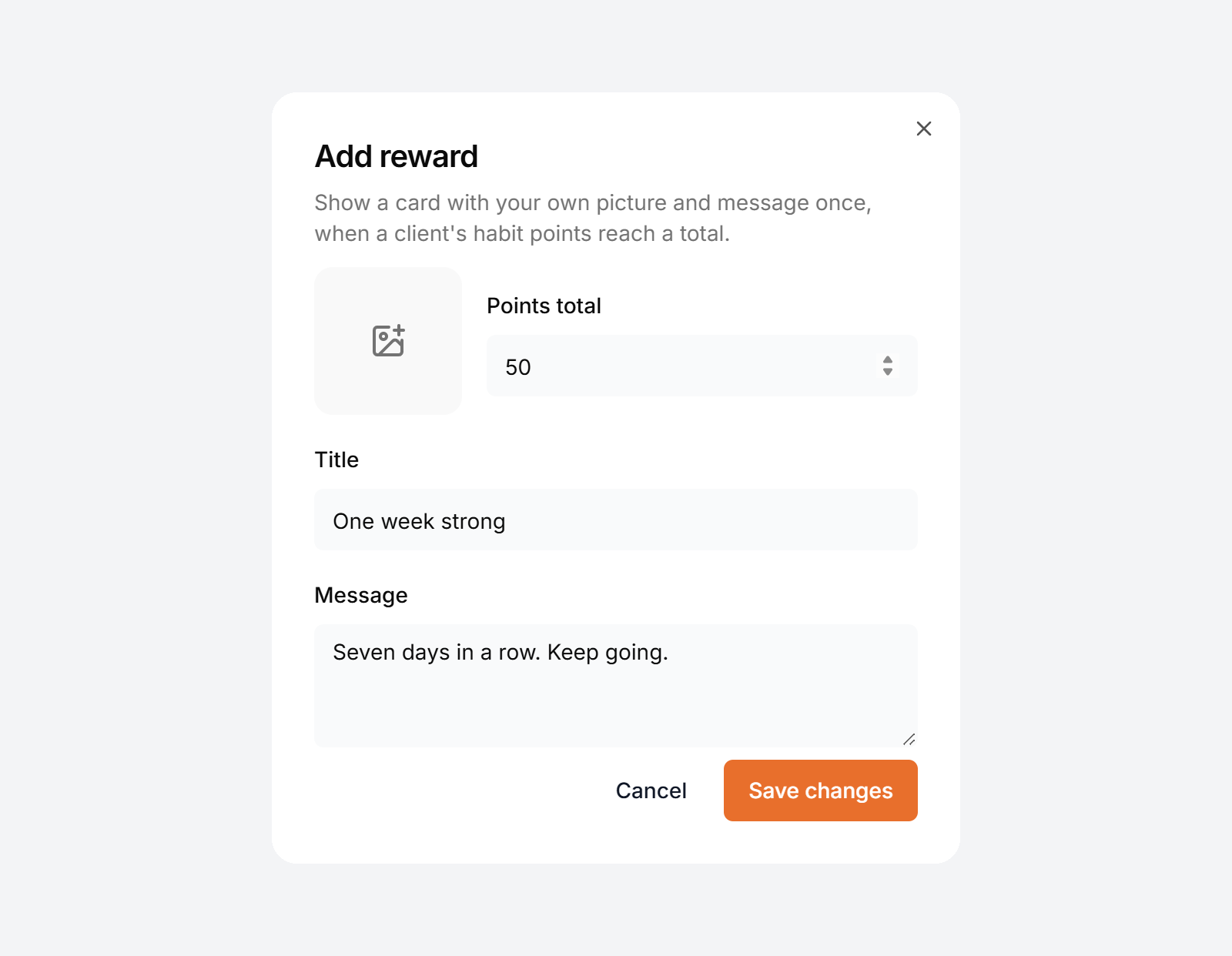 A reward is a card with your own picture and message, shown once when a client reaches its points total.